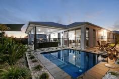 6 Macon Street Birtinya Qld 4575 This architecturally designed 
and beautifully presented home has the unique features that will make 
this the home you have been searching for. Individually designed to suit
 travellers or travellers with a caravan looking for a 'lock up and go',
 but also ideal for the tradie with lots of tools or those with lots of 
'big boys toys'. One side of the garage has been designed to fit large 
caravans/vehicles with 3200 x 3300 roller doors both ends leading 
through to nearly 10 metres of hard standing - perfect for a large 
caravan or boat. The garden and surrounds have also been designed as low
 maintenance in mind to cater for extended periods away, if desired. The
 heart of the home certainly revolves around the kitchen and 
indoor/outdoor living with generous spaces providing a great combination
 of ambience, liveability and functionality. All this located a 
stones throw from Lake Kawana and the new multi billion dollar health 
precinct at Birtinya and central to multiple choices of shopping 
centres, schools and amenities. Features include: -4 very generous bedrooms -Spacious master with ensuite and walk in robe to match -Stunning designer kitchen with top of the range appliances and large pantry storage -Open
 plan kitchen, dining and living accessing directly onto a great 40m2 
covered outdoor area containing a full size wet bar and BBQ. -Ducted air conditioning throughout -Full security system -vaccumaid -2700 ceilings throughout with 2400 doors and windows -2.5 bathrooms -2 gas hot water systems -Crim mesh to the rear patio stacker doors and windows -Swimming pool controlled by an Eco Pump -Oversize
 2 car garage 3200 x 3300 roller doors one side and 2400 x 2700 roller 
doors on the other. The garage also includes epoxy covering to the 
floors and enormous amounts of storage space. -Designed with excessive storage to all areas of the home.   