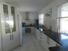  6 Coonawarra Court Yamba NSW 2464 We now take this tastefully renovated home to the market place. Have you been wanting a nice home at the right price nestled in the right position? "Then we deliver"! Have you been wanting a large saltwater in ground swimming pool? "We deliver"! Do you want the special money saving features such as solar water & solar grid feed? "We deliver"! This is a great opportunity to purchase this cute, 2 bedroom brick & tile home standing proud on a large 708 sqm flat block. Only a few hundred metre stroll to the boat ramp, Yamba Plaza Centre & public transport. It's in a safe & friendly neighbourhood too. This area is extremely sought after. It won't last long so be quick or you will miss your chance to call this house your home.  