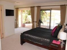  26/40 Cotlew St Southport QLD 4215  The Best Of Lifestyle Choices 4 beds + study/ office, 3 bathrooms, 2 car garage. Once
 you enter the security gates of the estate, you will find yourself in a
 world removed from the typical hustle and bustle, and the daily grind 
on the Gold Coast. Just imagine entering the front door of your prestige
 property too relax, overlooking your pool and the expansive waterway at
 your rear boundary. This home is filled with quality fixtures and 
fittings, a hostess kitchen, and bathrooms to luxuriate yourself in. The
 bedrooms are more than ample with built in robes to each. Can't you 
just see yourself lazing by the pool or having friends and family over 
for entertaining? Life would be great with a fully serviced tennis court
 at your finger tips, a sensational way to burn off energy or have fun 
with those who are important to you. When it comes to convenience the 
best of schools and the shops are only a short distance from your home. 
The Gold Coasts Premier night life precinct is close enough to enjoy but
 far enough away to not be imposing upon your quiet lifestyle. The 
popular Southport Golf Club is accessible from the estate and your only a
 short stroll too the Marble bar. Just imagine all this at your finger 
tips with the knowledge that you are safe within your fully secured 
estate lifestyle. What more could you want for your family and yourself. This property deserves your consideration and you deserve this delightful home. Inspection by appointment is the best way to see all that this home could offer you. Call Ross Busby 0450 271 287 