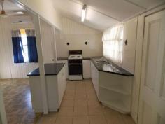 85 John Street, Rosewood, QLD - Bremer Valley Realty Two bedrooms + sleep-out & office 
* Lounge room with A/C 
* Modern kitchen open plan to dining with A/C 
* Renovated bathroom 
* Rear covered entertainment area 
* 878m2 block with room for a large shed 
* Walk to Rosewood shops & schools 