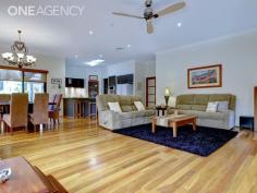  14 Wishart Loop Wanneroo WA 6065 Ready to enjoy the fruits of your labour? Over spending your weekends gardening? Want to relax, sit back and enjoy the good life? This MAGNIFICENT single level home boasts vast, exceptional living on minimal care 575m2 dress circle block, in the delightful Regent Waters Estate. Is this the home for you? Designer finishes throughout and impeccably presented, so viewing will impress!  3 bedrooms 2 bathrooms Home office 2 separate living areas storeroom/workshop side access with secured parking for boat or van.  * This layout has been cleverly zoned for full enjoyment and will accommodate the extended family or regular visitors with ease.  * Superb decor includes polished New Zealand hardwood floor, plush carpeting, designer fixtures and lighting.  * Relax under the verandah and watch the sun go down over the parklands.  * The enclosed games or theatre room provides a tranquil spot for the TV or movie enthusiast.  * The impressive Master suite has been cleverly positioned to optimize parental privacy. Resort style ensuite boasts twin vanity, luxurious bath and his and hers robes. Divine!  * The great room is just that, a great room for the whole family to congregate together. A beautiful space that will be the venue of choice for all your family gatherings.  * There is no excuse for the whole family not to help with the cooking in this stylish and very generously proportioned kitchen. Ample storage with overhead cabinets, pantry and abundant cupboards.  * Outdoor entertaining is provided under a domed all weather patio in a picturesque garden.  * The home office is ideal for a home based professional and comes complete with built in furniture.  * Two Queen sized bedrooms are fitted with walk in robes.  * The double door garage has a handyman's workshop.  * Side access provides secure parking for caravan or vehicle.  * Additional Features: Ducted reverse cycle air conditioning; perimeter security system; security doors; solar panels; bore reticulated gardens with water wise garden; storeroom; 135L gas storage hot water system; blow in insulation; garden shed; 2004 built by Broadway Homes For Sale: Coming Soon! Residential House Garages: 2 Land Size: 575 Sqm Year Built: 2004 Inspections: By appointment Features: Air Conditioning Built In Robes Ensuite Fully Fenced Patio Polished Floors Remote Garage Secure Parking Shed/Workshop Study Verandah 