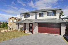  1/10 Corella Close Salamander Bay NSW 2317 BRAND NEW LUXURIOUS HOMES These spacious four bedroom open plan residences are almost complete. Downstairs features a beautifully appointed kitchen, large open living areas and al fresco dining. Also on this level is a roomy main bedroom, en suite, walk in robe and powder room as well as a 6 X 6 double garage. Upstairs there is a large family room, 3 bedrooms with built in robes and main bathroom. They all have that wonderful new feel with the latest finishes and appliances and will be finished within weeks. GET IN FIRST!! 