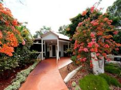  7 Greenwood Way Barragup WA 6209 PEEL REAL ESTATE welcomes you to 7 Greenwood Way Barragup. This is golden investment is situated on the corner of Pinjarra rd (250 meters of Pinjarra rd frontage) and it is located between the Freeway and Mandurah, its just a few minute's either way! This property makes a great contender for future rezoning and development. Gorgeous, immaculate cottage style home with 3 beds x 2 bath plus study loft home. 2 MASTER BEDROOMS with private bathrooms and an upstairs loft as bedroom 3. Extension drawing to the upstairs are available.  Reside, retire or rent it out (approx. $500p/week) and reap the rewards of owning 20,000sqm of primely positioned land. Yes! It is connected to mains water. Truly Amazing landscapes surround the home, lush lawns, gardens thick with delicious mature fruit trees and a small man made lake is home to local ducks and other wildlife. A display of commercial aviary's make this property suitable for a bird breeding sanctuary. Incubators and temperature controlled rooms are located behind the shed. A large open paddock fronts Pinjarra rd. There's a big powered shed and powered store room with a built in cool room 