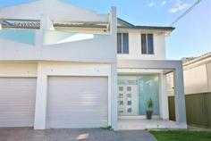 Georges Hall - 31A Denman Road Be
 quick to inspect this well appointed 3 bedroom duplex. Conveniently 
located close to parks, local schools and shops, this home will surely 
impress the fussiest of buyers and is perfect for the growing family. Featuring: Spacious open plan living, dining and kitchen 3 bedrooms, all with built in robes, main with ensite and walk in robe 3 bathrooms White polyurethane kitchen, stainless steel Omega appliances, glass splashback, ceaser stone benchtop Fully tiled throughout - upstairs and downstairs Timber stairs with glass balustrades Ducted air-conditioning throughout Single lock up garage Low maintenance yard For more information please contact Jason Mikhail on 0404 869 870. Please note agent interest in property being marketed for sale. 