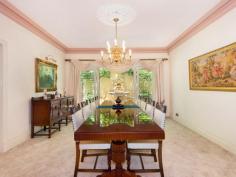  11 Carson Street Pymble NSW 2073 Ideally set in the Pymble exclusive east side "Golden Triangle" dress circle, cul-de-sac setting, just a 650m stroll to rail and village. One of Pymble's esteemed estates, this prized full brick residence, offers the perfect combination of grand scale living and entertaining. Privately positioned amid North facing landscaped grounds of 2737sqm, with approved subdivision for 2 titles. Capturing panoramic botanical views this family home has classical inspired interiors, offering a choice of living zones flowing to outdoor spaces. 