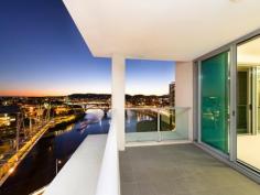  126/ 18 Tank Street,BRISBANE CITY QLD 4000 This modern, spacious 12th floor apartment in the heart of Brisbane's CBD represents an outstanding investment or lifestyle opportunity for those seeking inner-city living at its best. With magical panoramic views from the spacious alfresco entertaining area as the river city shines at night, entertaining with friends or even just unwinding after a hard day will be an exceptional experience. The sleek contemporary design features, generously proportioned bedrooms, open-plan living with a study area, entertainer's kitchen with stone bench tops, as well as brand new carpets and paint throughout, make this apartment feel “as new”.  The twin outdoor balconies are framed with large glass sliding doors that bathe the living areas in light and allow you to make the most of our relaxed Queensland lifestyle. Offering the ideal location, the Evolution building is within easy walking distance of the South Bank cultural precinct, Roma Street gardens, and the Queen Street Mall. An on-site car space is included but you may never want to leave home with amenities including a heated lap pool, spa, gymnasium, games room, media room, sky lounge and BBQ area. If you are looking to join the growing ranks of those discovering the joys of relaxed inner-city living, then this apartment ticks all the boxes. For those keen to invest, this apartment offers a range of options: either long-term rental (approx. $620-$650 per week unfurnished, or $690 - $730 furnished) or take advantage of the on-site management which offers short-term letting or a rental guarantee arrangement.  The exceptional CBD location, large floor plan (approx. 107m2), and views that can't be built out all help protect your investment long-term. If you are looking to invest in the always-growing Brisbane CBD market, you can't go past this opportunity.    