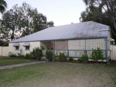 96 Ann Street Mitchell QLD 4465 QUEENSLANDER - CLOSE TO MAIN AMENETIES 3 Bedrooms (2 built-ins), Lounge/Dining, 2-way Bathroom, renovated Kitchen, Laundry area, Verandahs. Split-system air-conditioners, Fireplace. 2 bay Garage, 3 bay Carport, plus 2 concrete bays. Fenced 1841m2 block with access front & rear. Close to Hospital, Park, Shopping & Sports. General Features Property Type: House Bedrooms: 3 Bathrooms: 1 Land Size: 1841 m² (approx) Price per m²: $152 Indoor Features Air Conditioning Outdoor Features Carport Spaces: 3 Garage Spaces: 2 Eco Friendly Features EER (Energy Efficiency Rating): Low (0.0) Other Features Deck 