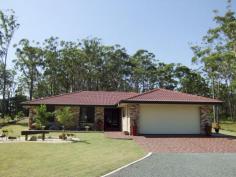 38 Whispering Pines Place Gulmarrad NSW 2463 This brick and tile home is set on over an acre of land 
(approx.4100sqm), in a unique area of rural residential living which 
offers a tranquil lifestyle with something special. The wonderful sandy 
beaches of Brooms Head are only 15 minutes drive away, or a day of 
enjoyment fishing on the Clarence River is only 5 minutes away. 
 This quality home will surprise with its grandeur as soon as you walk through the front door as it features;
 • A wonderful, simple, easy living design with emphasis on open plan.
 • Light filled air conditioned casual and family room.
 • Very spacious tiled, formal lounge.
 • The home features a generous outdoor area. A fully screened area 
accessed from the lounge and family living giving an additional room to 
the home throughout the summer months and perfect for alfresco 
entertaining with friends
 • Modern kitchen featuring stainless appliances, plenty of bench space and large pantry
 • Four bedrooms, all very large in size; the main boasts air 
conditioning, ceiling fan, walk-in robe, a beautiful ensuite and views 
of the gardens. All the other three bedrooms do include built-in robes 
and ceiling fans.
 • An additional office space allows for all four bedrooms to be 
utilised as bedrooms, or, there is the option of converting this area to
 a 5th bedroom.
 • The main bathroom is set in neutral tones with separate toilet offering easy access for all family members at all times.
 Landscaping of the yard has already been started with a variety of 
shrubs, palms and gardens beds to offer a tranquil setting and screening
 for privacy. Tall established trees at the rear of the block present a 
scenic back drop from all the living rooms. The property also features a
 shed for storage with a cover off the side giving a sheltered place to 
put your feet up and relax awhile.
 For casual living with elegance, call for an inspection today. 