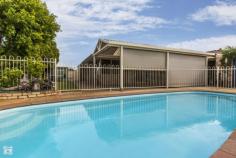  8 Jeavons Pl South Lake WA 6164 PLENTY OF ROOM TO MOVE !! Walk inside and be amazed by the size of this 6x2 family home! This home perfect for the growing family from the design of the house to the beautiful outdoor entertaining area and below ground pool. Located just minutes to schools, public transport and shops. 6 Bedrooms - Master bedroom with walk-in robe complete with shelving and ceiling fan. 3 of the remaining are double sized bedrooms with built-in robes and ceiling fans. PLUS STUDY/BEDROOM AND ACTIVITY/BEDROOM *Large ensuite with bath, shower, vanity and toilet. *Main bathroom with bath, shower, vanity and separate toilet. *Sunken formal lounge with stunning jarrah flooring, and cedar blinds. *Open planned living/dining/kitchen. *Beautiful kitchen with gas cooking, electric oven, double sink, dishwasher, fridge recess, large double pantry, overhead shelving and breakfast bench. (NEW APPLIANCES) *Skylights to kitchen and living area. *Living area with built-in bar, wine rack and ceiling fan. *Natural terracotta tiles to living areas. *Good size laundry with built-in benches and overhead cupboards.  *Two gas bayonet points. *New instant gas hot water system. *Evaporate ducted air-conditioning.  *Reverse cycle box air-conditioning in the dining area. *Double entry front doors with security. *Alarm system. *12 solar panels with a 3kw converter. *Double built-in linen cupboard and separate broom closet. *Large paved gable patio area entertaining area with caf blinds leading to salt chlorinated below ground pool including pool blanket and creepy crawly.  *Double lockup garage with rear access. *Brick tool shed-perfect workshop with power, shelving and benches. *Large garden shed. *Automatic bore reticulated gardens.
