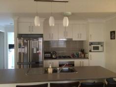 274 Goombungee Road Harlaxton Qld 4350 Near new 4 bedroom home featuring master bedroom with walk in robe and ensuite. There is a large island bench with breakfast bar in the kitchen which is centrally located for all your family to gather around at meal times. The family and living areas are fully tiled and feature a reverse cycle air conditioner.  Relax in the alfresco living area while entertaining friends or enjoying a quiet BBQ. There is room for the kids play equipment plus two large rainwater tanks and a lock up shed near the laundry, providing plenty of storage for your lawn mower and golf clubs. This home has been built on a large 670m2 block to capture the north easterly aspect and enjoys beautiful sunsets from being highly elevated featuring magnificent rural views. This home could rent for $380 - $390 per week.  All this only a short drive to the new Northpoint Shopping Centre. 