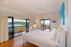  Whitsunday Blvd Whitsunday Islands National Park, Hamilton Island QLD 4803 This stunning low maintenance property features outstanding 180 degree sea and island views, overlooking Whitsunday Island to the east, through to Whitsunday Passage and South Molle Island to the west.  The property also features a 5 bedroom, 3.5 bathroom house designed by Chris Beckingham, is fully furnished & air-conditioned, with in ground wet edge pool and spacious verandahs and patios ideal for entertaining, all surrounded by landscaped tropical gardens and established quality properties    