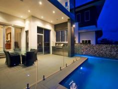 Sovereign Islands 5 bedroom luxury uniquely elevated to create a floating modern home
 • State of the art Smeg kitchen, double oven, butler’s pantry, Caesarstone
 • High quality - endless glass, Blackbutt timber, bi-fold doors, open plan
 • Luxury master suite features spa, rain shower, deluxe robe, dual vanity
 • Theatre purpose built with 3 tiers of seating, Breathtaking ‘glass’ office
 • 2009 HIA award winner, triple garage, 23 tonne concrete pontoon berth 