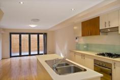  205/ 296 Kingsway, CARINGBAH NSW 2229 										This two storey apartment features an open plan living with polished floorboards. The modern kitchen includes gas stainless steel cooking with dishwasher and caeserstone bench-tops. Both bedrooms have built-in robes and main bedroom includes an ensuite. With internal laundry, split system air-conditioning, tiled courtyard and is conveniently located close to Caringbah Village and station. PETS NOT PERMITTED.  