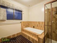  10 Mannetto Wishart QLD 4122 This North-Eastly aspect and original solid renovated brick and tile family home just needs a new owner. Three large internal separate living spaces give the parents privacy from the children. The external play areas are in full view from the kitchen and family/rumpus room. Externally the well positioned undercover entertainment and BBQ area allows seamless access to inside living through glass sliding doors. Windows provide lots of natural light to flow through to internal areas. The large laundry room has rear access to the backyard and undercover pergola areas. Linen storage space will make the home chores more bearable. The ceiling space is insulated. Tandem car port with an easy access to inside of the house. Garden shed will be of use. The gas hot water system will never leave you freezing in the shower this cold winter. • Within MANSFIELD High Schools CATCHMENT  • 3 spacious bedrooms all with built-in wardrobes + Study  • 2 bathrooms  • Gas cook top with stainless steel appliances in a big open plan modern kitchen  • High position facing north-east  • Air conditionings  • Gas hot water system  • Huge level backyard has Side access for boat, caravan or trailer Best described is convenient, location & position and close to Griffith University, Garden City & Carindale Shopping Centres - approximately only 14kms to Brisbane city with easy access to south and north bound freeways. 
