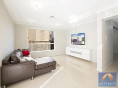  18 Moondarra Drive West Hoxton NSW 2171 Just over 2 years young & showcasing the latest in contemporary design & construction with its location described by Rpdata as being the 2nd hottest suburb in Sydney, is this ultra modernistic double story home packing an architecturally calculated flow & a multitude of smart spaces for your entertaining needs. Ready to accommodate a growing family with every amenity conveniently located minutes away, from swift access to M7, Hoxton Park & M5 road portals, child care to schooling, shopping & sporting/recreational fields to buses & Edmondson Park's brand new rail link soon to be in operation. Featuring; * 5 bedrooms with XL main, walk in & en suite * 2nd bedroom with walk in & built ins to remaining * Downstairs study or 6th bedroom immediately next to 3rd bathroom * Upstairs rumpus/retreat * Cutting edge granite bench kitchen  * 900mm stainless appliances & walk in pantry * Combination of living, dining, home theatre/games room, family & meals room * Bounce off the quality carpet & underlay upstairs * Easy maintenance porcelain tiles throughout downstairs * Massively high ceilings in the remote double garage with mezzanine storage * Possibility of installing hoists in the garage to fit 4 cars  * High ceilings with ducted air conditioning * Timber decking rear backyard with enough provisions for an in ground pool * Solar panels on the roof * Side access of up to 2.2m Local amenities & services include; Clancy Catholic College - 550 meters Greenway Park Public School - 1.2km Clever Cookies Early learning centre - 1.9km Gaurdian child care - 1.2km Bus Stop Interline Route 854 - 550 meters Bus Stop Interline Routes 852, 854, 864 & 867 - 500m Greenway Park Reserve - 700km Carnes Hill Marketplace - 1.2km M7 - 3km M5 - 7km Carnes Hill proposed community facilities - 1.4km 