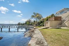  28 Albany Street Point Frederick NSW 2250 An extremely rare opportunity to purchase Albany street’s most iconic waterfront home, the ultimate in luxury and architecture. Be captivated by this alluring residence from the moment you enter. Exquisitely finished with a neutral palette and high quality appointments. This magnificent home is spread over 1157 sqm of prime waterfront land. One of only a few properties in Point Frederick featuring lift access to all 3 levels of the home. The seamless indoor/outdoor living and dining is designed to make the most of its waterfront position, with functionality and family lifestyle in mind. - 5 double sized bedrooms, 3 with ensuites - Boatshed with boat ramp, jetty and mooring - Purpose built home cinema - Saltwater inground pool - Extensive use of Travertine and Canadian Maple floors - Soaring ceilings and luxury fittings - 3 separate living areas - Marble bathrooms - Lighting control system - Aiphone communications to all floors - Computer operated security system incorporating video surveillance - Potential for self contained area above the 4 car garage - Ramp access Entertaining friends and family with the amazing backdrop of Brisbane Water will be a treat. This is an exceptional position in Point Frederick’s most prestigious streets located only moments to local schools, hospitals, shopping centres and yacht club. A property that must be inspected to truly appreciate all the many outstanding features this home has to offer. 