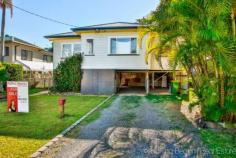 100 Oakley Ave East Lismore NSW 2480 LIVING in Oakley Avenue will make life so much more convenient with the shops, schools, and University all within a 15 minute walk. This high set weatherboard home will suit a family, first time buyer or investor. The polished floor boards and decorative cornices give the rooms some class. The kitchen offers the potential for a make over with gas cooking. Backing onto the kitchen is a sun room. The back yard has a Northerly aspect with plenty of level lawn for the kids to play. There is also a covered patio area for a shaded BBQ. Downstairs the home features a laundry and concreted area to park a vehicle. Located in the quiet of East Lismore with many sporting facilities close-by, such a home is sure to sell fast. Don't miss your opportunity to come and inspect today