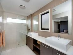  18 Aspire Street Rochedale Qld 4123 I cant write you a jazzy script about this property as it would be too long, instead here is a list of what we believe to be the best selling points of this gorgeous new home: :: Large 290sqm floorplan :: SAMSUNG Fully ducted air con, 3 zones :: Large open plan living :: Retractable doors to patio :: Built in entertainment unit shelving :: Scullery :: Separate laundry :: 5000L Rainwater tank :: Security system/intercom :: Parents retreat...... and separate study area :: Hidden walk through master wardrobe :: Large open plan ensuite with double sinks :: BOMPANI Oven, 5 Burner, Range and DW :: Vacumaid :: MONDELLA Tapware :: Foxtel satellite 