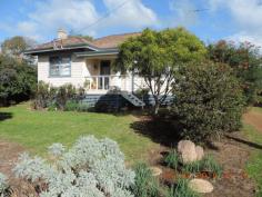  47 Railway Parade Katoomba NSW 2780 This amazing, Beautifully maintained home is situated only 5 minutes from the majestic Blackwood River and just a short stroll to all the town amenities. Nice country kitchen with plenty of room for a good size table It has 3 richly appointed Bedrooms, a generous size lounge complete with a classic wood fired combustion heater and reverse cycle air conditioner’ This delightful home also has the traditional high ceilings and polished Jarrah floor boards, doors and windows throughout .Outside is a large double garage/workshop and at the back of the home a fabulous roofed entertainment area and lovely cottage gardens. Also a garden shed. All this overlooks the natural bush reserve growing along the winsome Boyup Brook. 