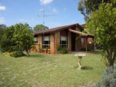 18 Muneela Ave Hawks Nest NSW 2324 Great Corner Position with Room to Grow! This very comfortable, 2 bedroom, brick & tile home is ideal for the first-home buyer, retiree or investor. It offers a spacious kitchen and bathroom, detached garage & carport, good living space and huge potential for extending into the fully-fenced backyard. The home has ceiling fans and is freshly painted throughout. A screened area is the perfect place for a bbq and entertaining. The property is well presented but plenty of scope to add further value by updating the kitchen & bathroom. The home is currently rented to an excellent tenant and showing good returns. Inspection by appointment. 