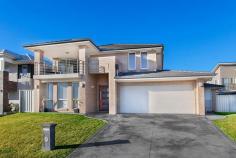 13 Augusta Pkwy, Shell Cove, NSW 2529 Overlooking magnificent 11th hole! Magnificently designed Masterton home perfectly positioned to take full advantage of the breath taking views. This home is truly one of a kind! Such a rare offering for the beautiful Shell Cove, the home boasts a myriad of profound features including ... * Five expansive bedrooms with the enormous master suite including a luxurious ensuite and walk in robe. * Multiple living areas, all spacious with ducted air conditioned comfort * Stunning kitchen with quality stone bench tops and stainless steel appliances * Private entertaining area flowing out to the backyard * West facing balcony overlooking the famous Links Golf Course and vast Escarpment views * Ultra modern bathroom and ensuite, both featuring baths and separate showers * Double lock up garage plus a side access for the boat or trailer 