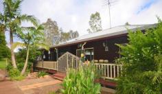 24 Flemington Road Beechmont Qld 4211 Built in 1990, is this tastefully renovated Queenslander. Awaiting your inspection! Some features are:- * 4 generous sized bedrooms all w/ built ins * 2.5 bathrooms, main with corner spa * Large open plan living * Hardwood Jarrah Timber tops, s.steel 5 burner gas cooktop, dishwasher & breakfast bar * Reverse cycle a/c + gas point * Office / games room * Polished timber floors * Raked ceilings * Set on approx. 2 acres (8008m2) of ex-dairy land, rich volcanic soil * Wrap around verandahs * Vegie patch + bore + water tanks Close to Beechmont Primary School and within the catchment area for Tamborine Mountain State High School. Inspection will Impress!   