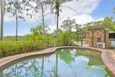 1 Magnolia Ln Bonogin QLD 4213 Private Hilltop Retreat with Panoramic Views 
 Hidden
 away in Mudgeeraba beautiful Hinterland with filtered views to the 
coast, is this fantastic low maintenance property with pool and air 
conditioning. Located only 8 mins from town this property has much to 
offer the family looking for a home with fantastic size. Featuring 4 
large bedrooms, master with en suite and walk in robe, large kitchen 
with spacious open plan living area, separate formal dinning and lounge 
area all built to capture the fantastic views on offer. The kitchen 
boasts granite stone bench tops, ample cupboard space, large fridge 
cavity with water and Miele dishwasher making meal time and entertaining
 a pleasure. All the living areas have large sliding doors which capture
 natural breezes, light and views which allow for easy access to the 
outdoor verandahs. Once you step outside you have a fantastic in-ground 
saltwater pool that the kids will love and a great outdoor pergola where
 you can sit and unwind after a long day with a glass of wine taking in 
the pretty lights the view has to offer. Ideally located this low 
maintenance 8057sqm property has so much to offer, only 8 mins to Robina
 Town Centre, Train Station, M1, and surrounded by some of the best 
schools on the Gold Coast it offers the best of both worlds. If your 
looking for close in private, low maintenance acreage this is a must 
see. Our motivated sellers have brought elsewhere and want this property
 sold. Call now to organise your own private inspection. 