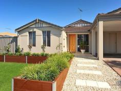  141 Glencoe Loop Kinross WA 6028 # HOME OPEN SUNDAY SEPTEMBER 28TH 12.00-12.45# LOOKING FOR THE WOW FACTOR....LOOK NO FURTHER THAN OUR NEWEST PREMIUM PROPERTY From the minute you approach this beautifully presented home you will appreciate the quality and class of the welcoming front façade with Eco friendly turf and surrounded pristine garden beds.... BUT you will be eager to view this beautiful home internally.... Wander through into the grand entrance featuring solid timber bamboo flooring, plush carpets and take in the ambiance of this elegant home..... To the left is the sumptuous master suite featuring blinds, beautiful organza curtains, large double robe and amazing fully tiled ensuite featuring double basin vanities, double shower recess and neutral décor..... Step through and enjoy the total relaxation of the gorgeous formal lounge and dining with the separate study within close proximity. The laundry is located close to the kitchen and is also renovated to an extremely high standard with plenty of bench space and cupboards..... Step through to the fabulous kitchen complete with stone bench tops, stainless steel gas cook top, range hood, oven and dishwasher,  the kids can enjoy sitting at the breakfast bar while giving Mum an update on their day...... Nearby is the casual meals and spacious well appointed family room with easy access to the great outdoors..... The three minor bedrooms are all located at the rear of the home with easy access to the kids activity room and renovated main bathroom..... Lets step out through the family room and discover the benefits of the spacious Alfresco with ample room to house a modular outdoor suite and table and chairs plus the family BBQ..... The below ground fully fenced fibreglass pool is SOLAR HEATED AND SURROUNDED BY TIMBER DECKING...... There is also plenty of yard and rear access and the backyard is designed with easy care luscious gardens.... OTHER AMAZING FEATURES OF THIS HOME INCLUDE REVERSE CYCLE AIR CONDITIONING, INSULATION, QUALITY FIXTURES AND FITTINGS IS WALKING DISTANCE TO BOTH SCHOOLS, SHOPPING CENTRES, PUBLIC TRANSPORT CALL ELAINE ON 0415 255 220 FOR ANY FURTHER INFORMATION.  