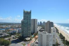  96/114 The Esplanade, Surfers Paradise QLD 4217 In one of the Gold Coast’s icon buildings – Focus Apartments. With two large bedrooms the apartment encompasses 94 square metres of living space. With North views and ocean outlook, there is plenty of natural light and sun all day. Offering a fully renovated large “entertainer” style kitchen with modern appliances including a dishwasher, four balconies (one off each room) and a large living/ dining; the apartment is generous in its proportions. The full renovation of the apartment is very recently completed. Including a separate laundry, main bathroom with large bath and separate shower and a large separate lock up garage with plenty of storage space. 