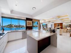  5713 Anchorage Terrace Sanctuary Cove QLD 4212 Pristine Refurbished Waterfront - Prime Location This luxurious single level residence is within the most prestigious waterfront area within Sanctuary Cove and enjoys the widest river expanse with a North to North East aspect. Fully gated and completely refurbished to an exceptional standard; it has spectacular vista to the main river. Sprawled across 1375m2 of prime land with a north easterly aspect, the interior of the home is spectacular and stylish but also offers a relaxed atmosphere where the water is visible from all indoor living areas. No expense has been spared on the interior of this delightful property which includes: *Formal entrance with chandelier *Sumptuous master suite with a stunning ensuite and dual walk in robe *2 king size bedroom suites set apart from the master *Gentleman's study with own access (could be a media room) *Stunning guest powder room *Kitchen with uninterrupted water vista *Concealed temperature controlled wine storage room *Concealed bar *Lounge and living area overlooking the river *Large fully fenced resort style pool on the water's edge. *Mooring to accommodate a very large boat *Easy care lawn and garden General Features Property Type: House Bedrooms: 3 Bathrooms: 4 Indoor Features Ensuite: 3 Living Areas: 2 Toilets: 4 Alarm System Indoor Spa Study Floorboards Broadband Internet Available Built-in Wardrobes Dishwasher Ducted Vacuum System Ducted Heating Ducted Cooling Outdoor Features Remote Garage Secure Parking Garage Spaces: 3 Open Car Spaces: 4 Courtyard Outdoor Entertaining Area Fully Fenced Swimming Pool - Inground 