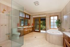  97 John Oxley Dr Frenchs Forest NSW 2086 WOW!!- THIS IS SOMETHING VERY SPECIAL & ON LEVEL 1176sqm TOO!! 6 4 2 If you are looking for quality, lifestyle and space, then this is what you are looking for! Exclusive residence of 'Grand proportions' in sought after John Oxley Drive. Huge 1176sqm level block on the high side of the street. 6 extra large Bedrooms most with access to wrap around verandah, (three of which are 20ft x 20ft with built-in cupboards and solid timber desks). The Master bedroom boasts a large walk-in-robe and dressing room, ensuite with double shower, double jet spa-bath, double vanity and dressing table. 4 Bathrooms in total featuring lead light windows, 2 with full sized spa baths. The large Open Plan eat-in kitchen captures the morning sun and looks out over the pool and gardens. Adjoining lounge room, with feature raked stained timber ceiling, opens out to huge undercover alfresco entertaining & BBQ area, salt water solar heated in ground pool, cantilever sun umbrellas and spacious low maintenance landscaped gardens with plenty of room for children to play or adults to party!! Watch the latest movies in your own home Movie theatre with wall size screen or work out in the large gymnasium with mounted TV. Separate study (home office) or library and extra large laundry. Other features include: quality fixtures, fittings and electric blinds throughout, high ceilings, mesh leaf guard on all gutters, Chatswood, district and Garigal National Park views, 19 Solar panels(earning approx. $1,000 quarterly return - don't pay another power bill, let them pay you!), 5 water tanks totalling approx. 21,000 litres Bus stop at rear to city and Chatswood  Close to schools, shops, Chatswood, City, beaches and new hospital, beautiful bush trails/walks. To inspect contact Iain Mackinnon 0412 360 945 or Fiona Davies 0405 588 224. Property Features Swimming PoolBuilt-In WardrobesClose to SchoolsClose to ShopsClose to TransportFireplace(s)GardenTerrace/Balcony 