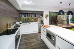  9 Ashgrove Ave Runaway Bay QLD 4216 Property Information Auction Date:Wednesday 15 Oct 11:00 AM (16 Queensland Avenue, Broadbeach)Open Home Dates:Saturday 20 Sep 2:00 PM - 2:30 PMThis stunning home is the perfect entertainer and is sure to impress! Newly built in March 2012 and still under builder's warranty, the home has impressive modern design and style throughout. Be prepared to be blown away the moment you walk through the door. Some features of the property include: * Main bedroom with walk in robe and designer ensuite * Impressive decadent kitchen with modern appliances, Caesar stone bench tops, glass splash backs and butler's pantry * Open plan living area combined with kitchen and dining, flowing through to the outdoor area * Warm and inviting media room opens out onto the outdoor entertaining area * Separate study, air conditioning, ceiling fans * Astro-Turf in the backyard means more time in summer to spend in the pool! * Sparkling in ground swimming pool, fully fenced * Beautifully landscaped and designed outdoor entertaining area overlooking the pool * Double lock up garage with double carport * 637m2* block The property is only minutes from the Broadwater, close to several schools and a few minutes' drive to Runaway Shopping Village, Harbour Town, Gold Coast Hospital & university. This needs to be on your list to inspect. Property Type 	 House 