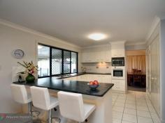  19 Cocoparra Crescent Parkinson Qld 4115 2 HOMES FOR THE PRICE OF 1 This outstanding property is designed for entertaining and dual living both at the same time.  Offering versatility and functionality to suit the changing needs of your family - here you have 2 homes in 1 with a fully self-contained guest wing downstairs. Ideal for: *Elderly parents wanting independence but having you close by *Teenager retreat where they have their space and you have yours *Extra family or guests staying over *Extra living for the big family *Home-based business Packed full of features, here are some fast facts: MAIN LIVING: *4 good-sized upstairs bedrooms (all with BIRs) - including a massive air-conditioned master bedroom with WIR + European-style en-suite with spa bath, double vanity and separate toilet *Central modern kitchen with quality appliances, heaps of bench/cupboard space, triple pantry + dishwasher *Formal living and dining with impressive high raked ceilings *Family/casual meals area *Main bathroom with bath + separate shower GUEST WING: *Kitchenette with heaps of storage *Casual dining/meals area *Air-conditioned formal living with separate entry for complete independence *Full bathroom with shower + toilet *Spacious master bedroom with twin BIRs *Separate access to outdoor entertaining EXTRA FEATURES of this unique property include: *Massive wrap-around insulated patio with quality shade blinds *Solar-heated saltwater pool with giggle seat + cascading waterfall - bordered by sandstone paving and glass panel fencing *Massive poolside umbrella + built-in BBQ *Double garage with built-in laundry *Fully-enclosed and gated back yard for the kids to play safely *Quality 5kw solar-power system *2 garden sheds *5,000 litre water tank + pump *Security alarm + security screens on all doors/windows This fantastic north-facing property is situated on a big 830 sqm block and just a short stroll to city-express bus, walkways and parkland. It offers so much potential, versatility and opportunity. Only an inspection will reveal how it all comes together. Properties like this are hard to find. So be quick to inspect - call for an appointment at any time - or view at open house. 