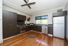  10/13-15 Terrace Place Nelly Bay Qld 4819 This two bedroom townhouse is well-located on Nelly Bay beachfront, close to shops, cafes and the marina. * The top floor of the townhouse features a large open-plan living area opening onto a balcony with panoramic water views across to the mainland. * The property is fully air-conditioned with ceiling fans throughout and beautiful polished wood floors with tiles to the wet areas. 