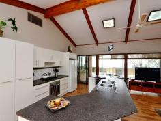  37 Hillside Gardens Desert Springs NT 0870 Double Delight A two storey home that the kids will love! Impressive from the street there is space for everyone and some left over.  Chequered floor tiles make a statement at the entrance with a formal living area and fourth bedroom also at ground level. A slow combustion heater on the mezzanine floor keeps the home cosy in the winter and split systems as well as evap air cover the summer months. An abundance of glass offers fabulous views from the kitchen and family room over the landscaped gardens, swimming pool and parklands beyond. Timber decking spans from the living areas giving further outdoor entertaining options. Three more bedrooms are on the top floor and all have French door access to the front balcony and southern range views. The main bedroom comes with a walk in robe and ensuite bathroom. For convenience there is a third toilet. A double carport and plenty of under home storage adds to the value. General Features Property Type: House Bedrooms: 4 Bathrooms: 2 Indoor Features Split-system Heating Air Conditioning Outdoor Features Carport Spaces: 2 Balcony Other Features Formal Dining Room, Formal Lounge, Inground Pool, Outdoor Living, Range Views, Reticulated Garden, S 