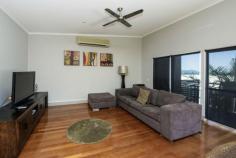  10/13-15 Terrace Place Nelly Bay Qld 4819 This two bedroom townhouse is well-located on Nelly Bay beachfront, close to shops, cafes and the marina. * The top floor of the townhouse features a large open-plan living area opening onto a balcony with panoramic water views across to the mainland. * The property is fully air-conditioned with ceiling fans throughout and beautiful polished wood floors with tiles to the wet areas. 