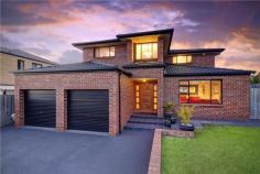  1 Wellington Ave Kellyville NSW 2155 Beyond the discreet & deceptive façade of this truly magnificent 
property, lies an abundance of light filled interiors. Simplicity in 
design and perfection in floor plan layout, the moment you step through 
the front door, the impressive wide grand entry hallway, with its high 
vaulted ceilings, just leaves you breathless. Designed with no expensed 
spared & immaculately well maintained, this home features luxuries, 
rarely offered for sale, especially in such an astute, fantastic 
location. Boasting four spacious upstairs bedrooms, the main 
featuring a stunning contemporary bathroom, a great size built-in & 
an additional large WIR, fit for a queen. All bedrooms have either a 
built-In or WIR. Two stunning bathrooms & three toilets, in total. Downstairs
 features, multiple informal & formal living areas, presenting a 
combination of tiled & solid timber floorboard’s throughout. A warm 
& inviting formal lounge with a welcoming fireplace, two more either
 full size bedrooms/office/study rooms, complimented with a nearby 
powder room. A large internal well configured practical laundry with a 
WIR, for additional storage, which is just perfect for guest or in-law 
accommodation. An incredibly large family size Kitchen, featuring 
stainless steel appliances, electric fan forced oven, range hood, & 
D/W, including a chefs dream pantry with multiple shelving. Although 
configured separately, the adjoining family living & dining areas, 
provide a comfortable & relaxed open plan atmosphere, whilst 
overlooking the outdoor alfresco undercover entertaining area, coupled 
with the beautiful sparkling in ground pool. 