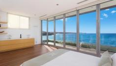  30 Marine Parade Lurline Bay NSW 2035 A stunning architecturally designed waterfront residence
 Beautifully situated on the northern cliff top of the 
exclusive Lurline Bay is this absolutely stunning waterfront residence. 
Crafted by leading architect Timothy Hadiwibawa, the sophisticated 
contemporary design compliments the unrivalled uninterrupted views that 
stretch along the rugged coastline to the sandy shores on Bondi beach. 
Impeccably appointed throughout this breathtaking offering is the 
epitome of luxurious coastal living. Merely moments to the natural Mahon
 ocean bath, Jack Vanny reserve and the glorious Maroubra Beach. - Generous open lounge and dining area flow to a sun-drenched north facing entertaining terrace - Deluxe gas kitchen equipped with Gaggenau appliances - Heated plunge pool, private rear courtyard - Master bedroom has uninterrupted ocean views and private terrace - Unfinished marble feature wall, timber blackbutt flooring, security alarm, reverse cycle air - Double lock up garage with internal access, ample storage - An enviable ocean front reserve position on the stunning coastline path - Land size 518 sqm Approximately - Council $5,195.85 per annum - Water $176.61 per quarter - Jason Black 0414 891 797 or Brent Foster 0411 032 474
 