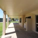  Gordonvale QLD, 4865 3 bedroom home with an additional 4 th room located at the back of the property with ensuite.  Air conditioned living area open to kitchen compete with overhead cupboards, dishwasher and gas stove. All bedrooms air conditioned and have robes.  Double remote gate keeps property secure. Long carport/open patio, large 3 bay shed with 2 roller doors. Large rear fenced yard also has a sand pit and large garden shed. Avail 01/10/2014. Pets Neg 