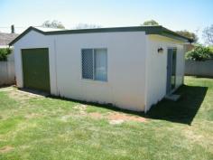  50 Bando St Gunnedah NSW 2380 This ideal home close to the golf course makes a sound investment with a current 6.7% gross return on investment – a prime opportunity to capitalize on a town moving forward. Plenty of room to move with three bedrooms – two with built-in robes, additional granny flat/utility room annexed to lock up garage. Well fenced with garden lock up sheds and carport. Lounge and rumpus, centrally located kitchen, bathroom with shower/bath/vanity, separate toilet and internal laundry. Ducted evaporative cooling for summer, gas heater for winter. Current lease expires 7 Feb 2015 with tenant paying $380 per week. Get in quick! - See more at: http://www.ewingrealestate.com.au/listings/residential_sale-225219-gunnedah/#sthash.0dfmD9l0.dpuf 