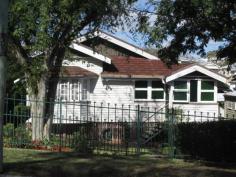 51 Lewis St Camp Hill QLD 4152  This beautiful Queenslander has been maintained ever so well throughout its life. It presents beautifully, by the same family who was raised here, all those years ago. Typical of the era, it has two large bedrooms, with built in wardrobes. The master has a pretty bay window and window seat, and there is also a good sized sleep-out. The home has been updated at different times to have a modern timber kitchen with stainless appliances and an island bench/breakfast bar. The bathroom has also been done, so you can move in and live straightaway. There is already a huge back timber deck, so theres plenty of living space. If you lift the carpets, you'll find the original wide boards, which will polish up beautifully, and the home is complete still with the original VJ's and casement windows. A great street in Camp Hill, with a lovely old home on 607m2, this one is worth a look! Property Features & Amenities     General Features         Property Type: Residential         Bedrooms: 2         Bathrooms: 1         Parking: 1     Other Features         Air Con 