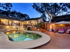 18B Prahran Ave Frenchs Forest NSW 2086 This is a rare opportunity to secure a truly stunning and unique family entertainer in one of Frenchs Forests most sought after locations. Within short walking distance to schools, shops and transport you will be able to take advantage of all that Frenchs Forest and Davidson has to offer. Situated on a generous 2238m2 block, its impeccably presented 3 bed, 2 bath layout takes full advantage of its private tranquil setting with uninterrupted tree top views as far as the eye can see. Boasting large vaulted ceilings with floor to roof glass, newly renovated gourmet kitchen, open plan living areas, wrap around entertaining balcony overlooking the resort style pool. This property is one that cant be missed! - Beautifully finished gourmet kitchen with granite bench tops. - Open plan entertaining and dining rooms with uninterrupted views. - Generous 2238m2 block with a sun drenched North East aspect. - Wrap around entertaining balcony overlooking the solar heated resort style pool. - Vaulted ceilings with floor to roof glass. - High quality Blackbutt timber flooring. - Air conditioning throughout. - Gas heating and Bosch instant hot water. - Large double lock up garage with undercover parking for four. - High Quality Bathrooms with heated floors and towel racks.   Property Features:     3 Bedroom     2 Bathroom     4 Parking     2238m2 Land Size 