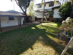  230 Cornelia Road Toongabbie NSW 2146 Presentable spacious 5bdrm family home -Corner site 632m2 Dual Occupancy (STCA) Well presented two storey family home with lock up garage, situated on a corner 632m2 block. Whilst being within a short stroll to Metella rd Public School, and Transport.  Featuring, Spacious living throughout, with hallway entrance that leads out to welcoming lounge room, (with high ceilings and timber flooring) that flows out to a good size kitchen, which in turn offers ample bench and cupboard space, together with an additional dining area Consisting of 5 good size bedrooms (with 3bdrms featuring mirrored built/ins and ensuite to master). Plus a huge upstairs rumpus room, with its own balcony. Ideal for teenagers, 2nd living area, games room, etc. Also offering renovated bathroom, with 3rd toilet in laundry. Private and secure rear yard, with colourbond fencing. Loads of space for family pets, or outdoor activities. Ample off street parking with lock up garage, plus side access to rear yard ideal for boats, caravans, etc.In addition dual/joining driveway available at front of property (has its own side street entrance) General Features Property Type: House Bedrooms: 5 Bathrooms: 2 