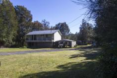  915 The Entrance Rd Wamberal NSW 2260 One Acre - Main Road Exposure House - Property ID: 728097 Level, one acre lot surrounded by council reserve land with direct main road exposure. Less then one kilometre to beach. Three bedroom elevated home with large machinery shed. 