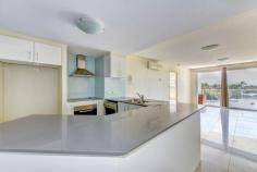  Unit 16/5 Whalley Street Bargara Qld 4670 Fourth floor two bedroom apartment with a sought after Northerly aspect, the ideal outlook to catch the Queensland winter sun. Views from the tiled balcony have a coastal aspect overlooking the township out to the ocean in the distance. The generous open living / dining area is tiled and air-conditioned. Adjoining is the attractive kitchen with Cesar Stone bench tops, ample cupboard storage, electric cooktop, under-bench stove, large refrigerator space, dishwasher and pantry / linen cupboard. The main sun filled bedroom has good views, carpet, is air-conditioned, there is a walk-in robe and en-suite bathroom Bedroom two has new carpet, is air-conditioned and has a built-in robe with mirrors. The main bathroom is very practical with bath, vanity and second toilet. There is a separate laundry. 