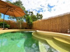  37 Hillside Gardens Desert Springs NT 0870 Double Delight A two storey home that the kids will love! Impressive from the street there is space for everyone and some left over.  Chequered floor tiles make a statement at the entrance with a formal living area and fourth bedroom also at ground level. A slow combustion heater on the mezzanine floor keeps the home cosy in the winter and split systems as well as evap air cover the summer months. An abundance of glass offers fabulous views from the kitchen and family room over the landscaped gardens, swimming pool and parklands beyond. Timber decking spans from the living areas giving further outdoor entertaining options. Three more bedrooms are on the top floor and all have French door access to the front balcony and southern range views. The main bedroom comes with a walk in robe and ensuite bathroom. For convenience there is a third toilet. A double carport and plenty of under home storage adds to the value. General Features Property Type: House Bedrooms: 4 Bathrooms: 2 Indoor Features Split-system Heating Air Conditioning Outdoor Features Carport Spaces: 2 Balcony Other Features Formal Dining Room, Formal Lounge, Inground Pool, Outdoor Living, Range Views, Reticulated Garden, S 
