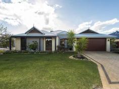  49 Pavilion Circle The Vines WA 6069 Your only local Real Estate Office, The Vines Real Estate offers the following quality home in a great location For Sale.  Immaculately presented 3 bedroom 2 bathroom home backing onto the golf course and with only one adjoining neighbour offers a haven of serenity, style and privacy in an exclusive location.  This is your opportunity to live in a quiet and secure area within strolling distance to The Vines Resort & Country Club.  If you are looking to downsize in size but not quality, then you need to view this superb home.     Theatre/TV room (easily converted to 4 th  bedroom if required) Wide foyer flows through to open plan living area with high 31c ceilings Main sitting area with built in gas fire place overlooks private side garden and opens to alfresco living Well appointed kitchen has abundance of cupboard and bench space, walk in pantry, s/steel appliances and views to rear Dining area opens to alfresco living under the main roof Delightful private king size master bedroom at the rear of the home with its own security door to outdoor garden and sitting area The master ensuite has double vanity, shower, corner bath and separate toilet 2 nd  bedroom is also king size and has a built in robe 3 rd  bedroom is queen size and has a built in robe Both minor bedrooms face the front with garden views and are serviced by the main bathroom and separate toilet/guest powder room Laundry with ample 3 door sliding linen and broom cupboard The stunning outdoor is a green haven with lawn and hedging giving it total privacy whilst maintaining views to the golf course and lake in the distance Double remote controlled garage has rear roller access, extra storage space and shoppers entrance to house Solar gas boosted hot water system, ducted air conditioning, 3 phase power, monitored alarm system, smart wiring Beautifully maintained gardens and lawn reticulated from mains Land area – 491sqm corner lot   For further details please contact PAM MITCHELL from The Vines Real Estate all hours on 0407 192 792 – YOUR DEDICATED VINES PROPERTY SPECIALIST – SERVICING YOUR IMMEDIATE AREA – DELIVERING PREMIUM RESULTS – LIVING AND WORKING LOCALLY 