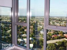 12104 8 Harbour Rd HAMILTON Qld 4007 This beautiful modern two bedroom apartment could be yours. This apartment is light, airy and embraces the vast views of Hamilton, Ascot and out as far as Moreton Bay through the double glazed floor to ceiling windows. The fully carpeted open plan living area embraces a large linear styled kitchen with quality Omega appliances. The master bedroom features an ensuite, the second bedroom features floor to ceiling windows, built in robe. With all of these features it is a rare find and will not last. This apartment also comes with 2 car parking spaces and use of all the Hamilton Harbour facilities including the beautiful resort style lap pool and BBQ area surrounded by lush tropical gardens. 