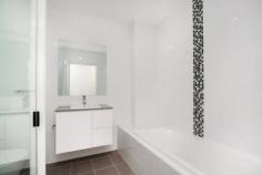  16/100 Tennyson Road Mortlake NSW 2137 A stunning brand new apartment finished to perfection with high quality fittings, featuring a spacious well designed sunlit floor plan & situated within a luxurious boutique security development, just moments from the waters edge & the areas vibrant cafes/eateries. * 2 spacious bedrooms, (main with ensuite), built ins, large open plan lounge & separate dining, high ceilings, air con * Stylish CaesarStone gas kitchen with Miele stainless steel appliances, dishwasher, 2 stunning bathrooms * 2 deep balconies perfect for entertaining, double security parking, lift access, video intercom * Short walk to waterways, transport, shopping village, cafes & restaurants 
