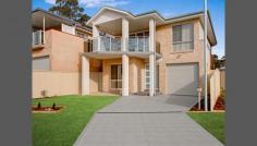  140 Grand Parade Bonnells Bay NSW 2264 Life Was Meant To Be Easy! A delectable offering, everything that you would want in your brand new home is here. A beautifully put together four bedroom home with a perfect north aspect providing sun filled living areas and wonderful views over Lake Macquarie with a Watagan Mountain backdrop. Features include large living areas, built in robes and ensuite, gourmet kitchen and the highest quality inclusions. Incidentals such as ducted air conditioning, security system double garage and landscaped gardens are a given, there is nothing to do but move in and enjoy. Situated directly opposite the waterfront of Bonnells Bay and only 60 mins north Sydney. 